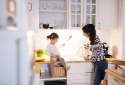 Neli Client in Kitchen Space with Daughter