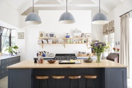 Large family kitchen in period conversion house, straight on